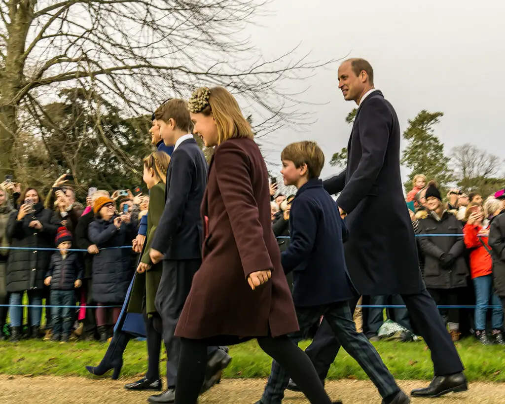 Mia Tindall walks with the Prince of Wales and his kids