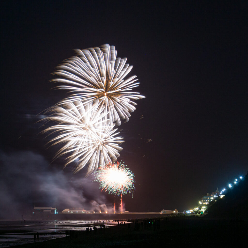 white fireworks high over Cromer Pier on 1 January