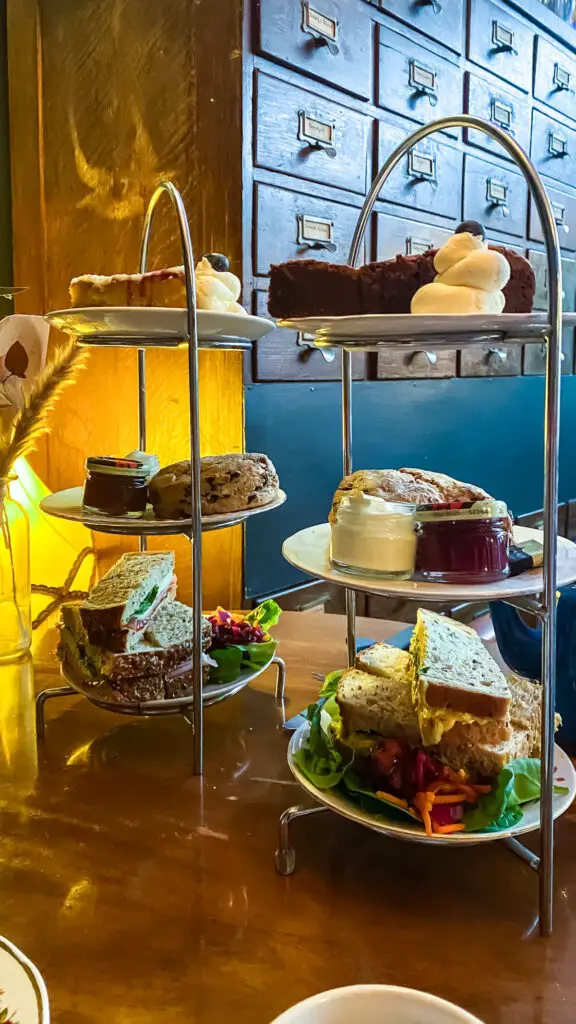 two three-tiered trays full of food for our afternoon teas at Biddys