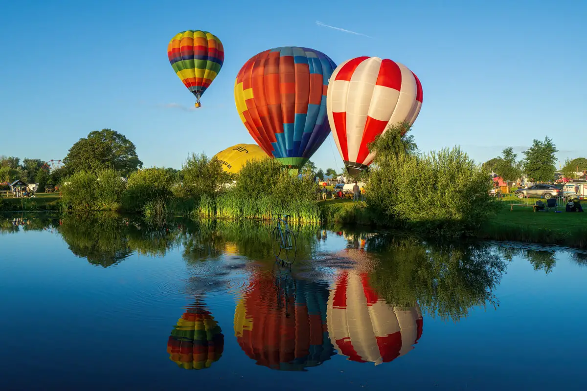 colourful balloons at the old buckenham balloon festival for the early morning flights