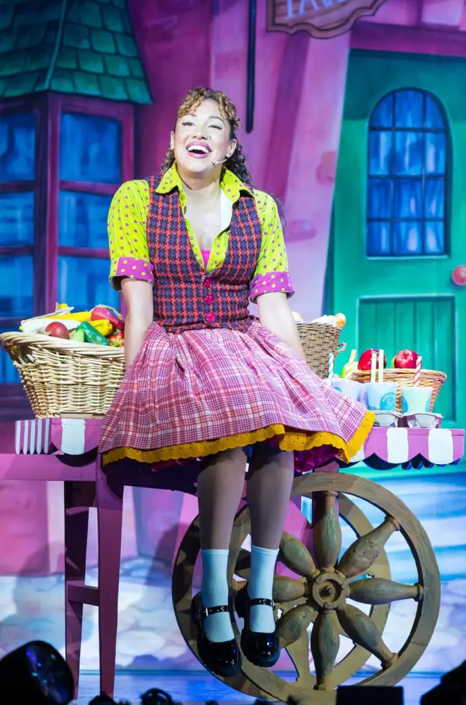 Jazz sits on a cart on the stage during Aladdin at Norwich Theatre Royal